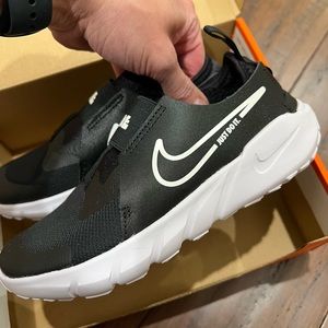 2 pair of new nike flex runner 2 . Little boys size 2